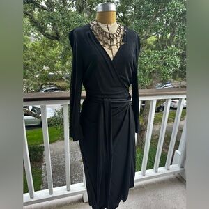 Diane Von Furstenberg wrap dress. Classic staple. Size 12. Midi length.